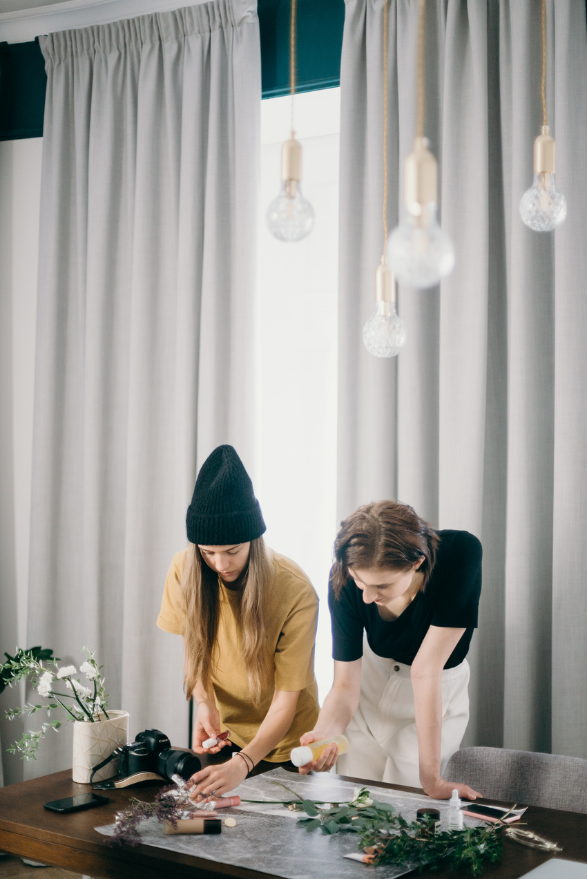 Woman in Black Knit Cap and Brown Shirt